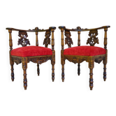 Paire de fauteuils d’angle néo-Renaissance Henri II en bois sculpté XIXe