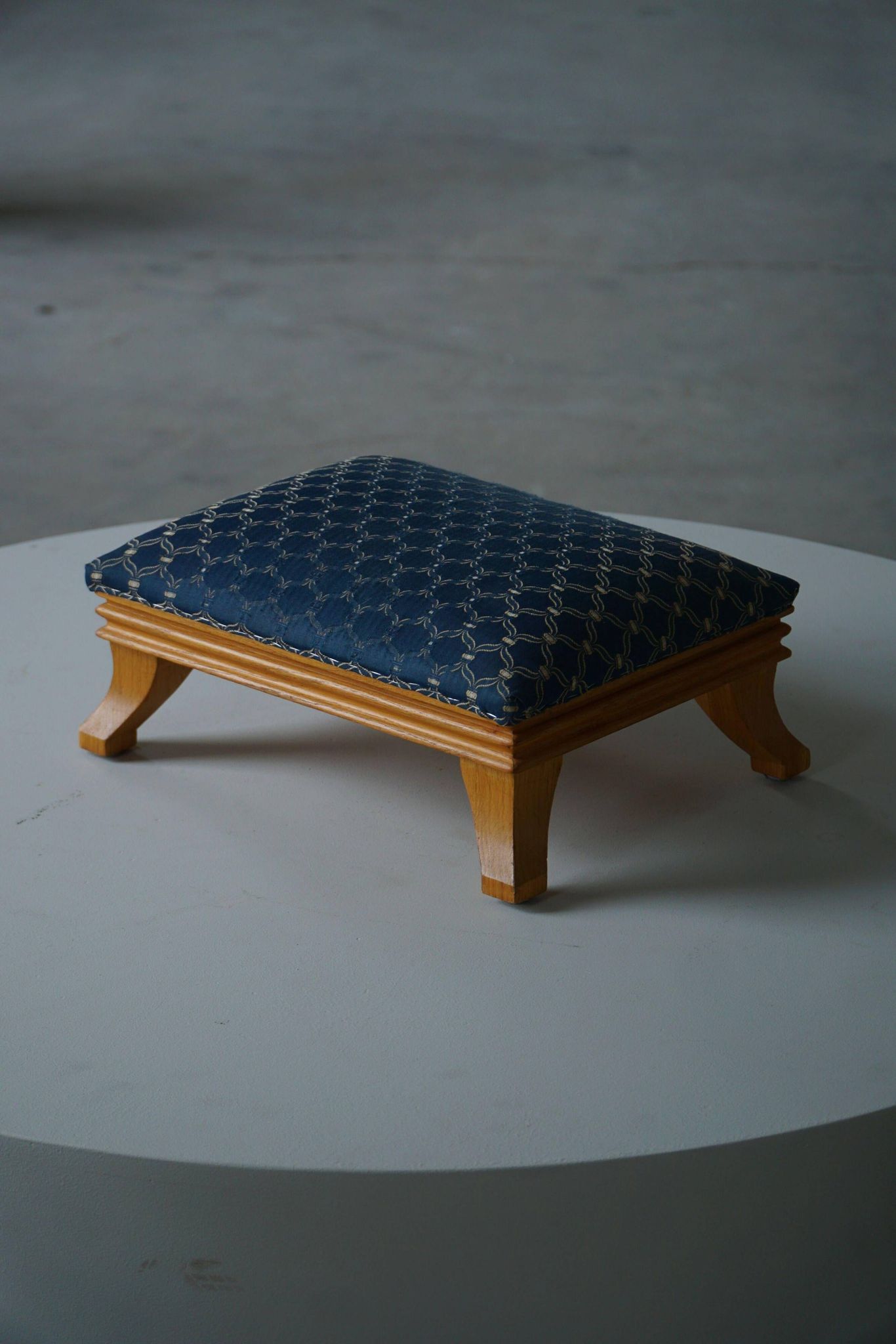 French Art Deco low stool with vintage upholstery made in the 1940s.