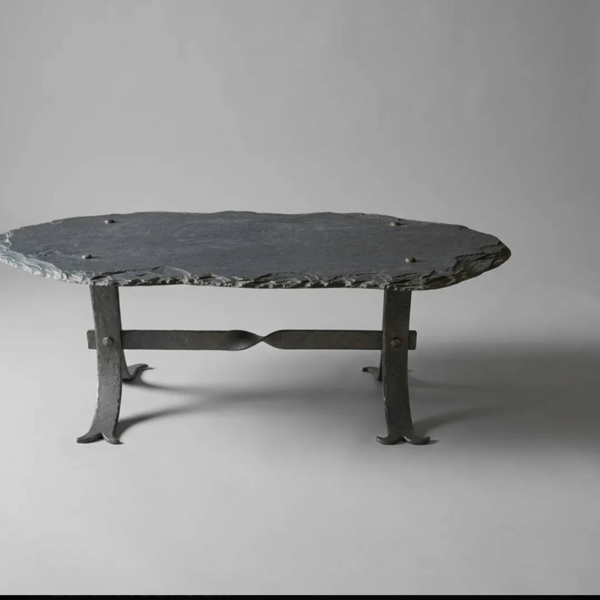 Coffee table with a stone top, France, circa 1960.