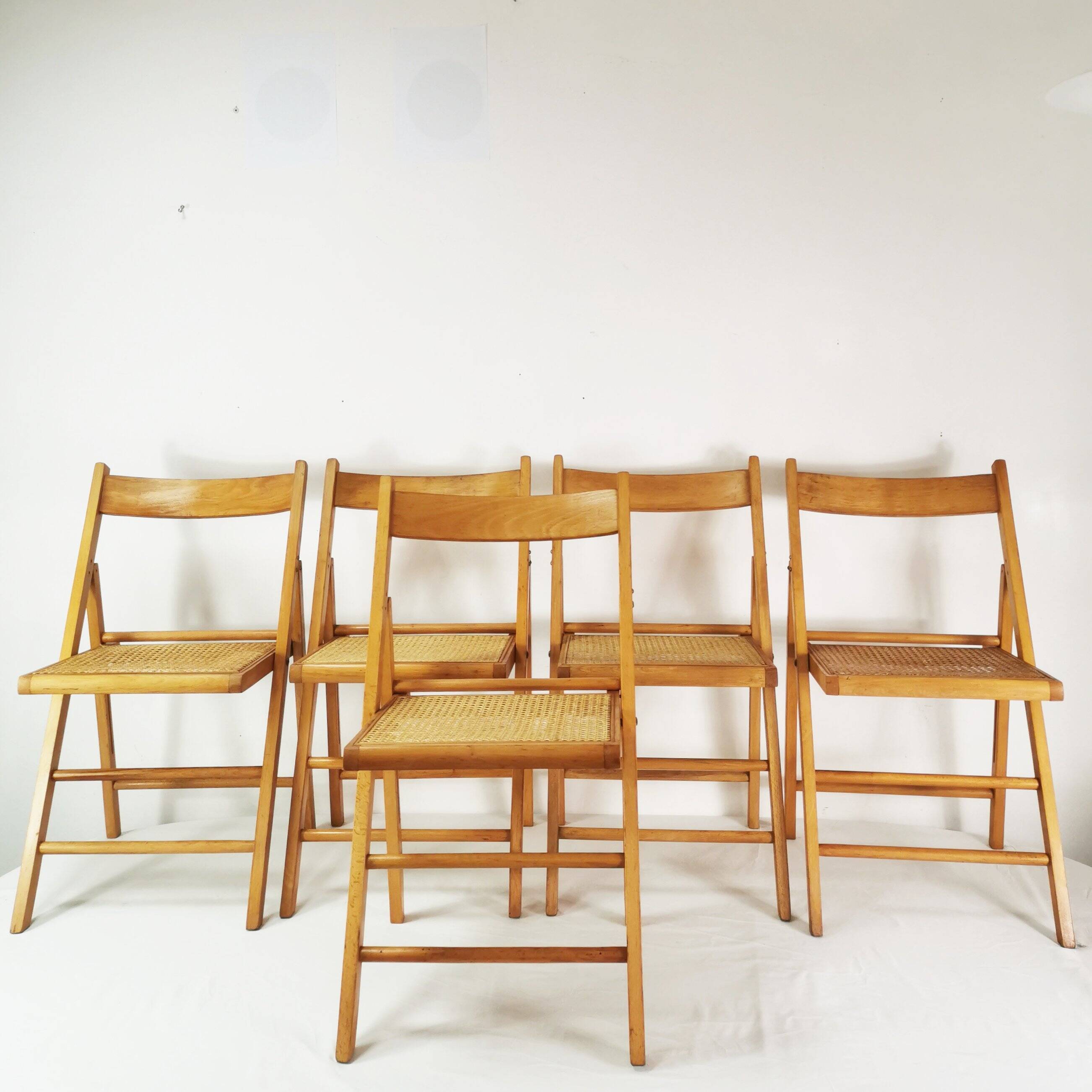 Set of folding chairs with raffia, Germany, 1980s.