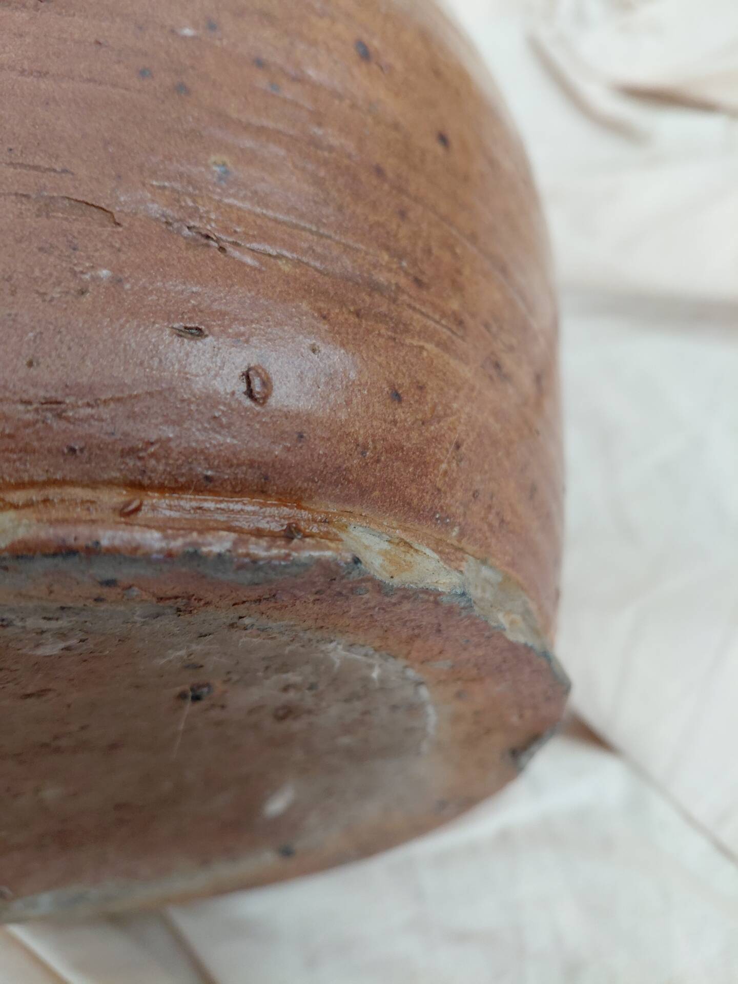 Old farm jug in glazed stoneware