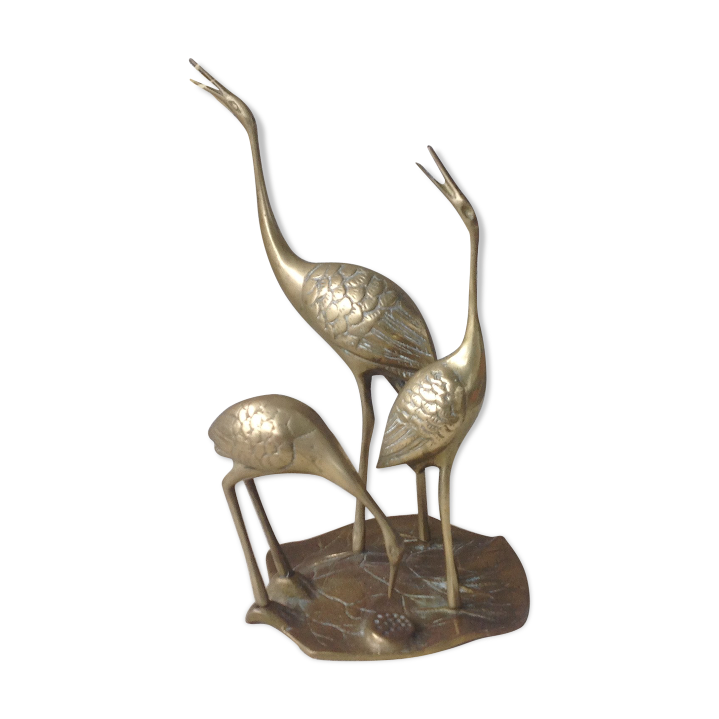 Golden brass herons