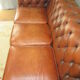 Brown leather chesterfield sofa