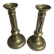 Pair of antique brass candlesticks with adjustable push mechanism from the 19th century.