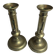 Pair of antique brass candlesticks with adjustable push mechanism from the 19th century.