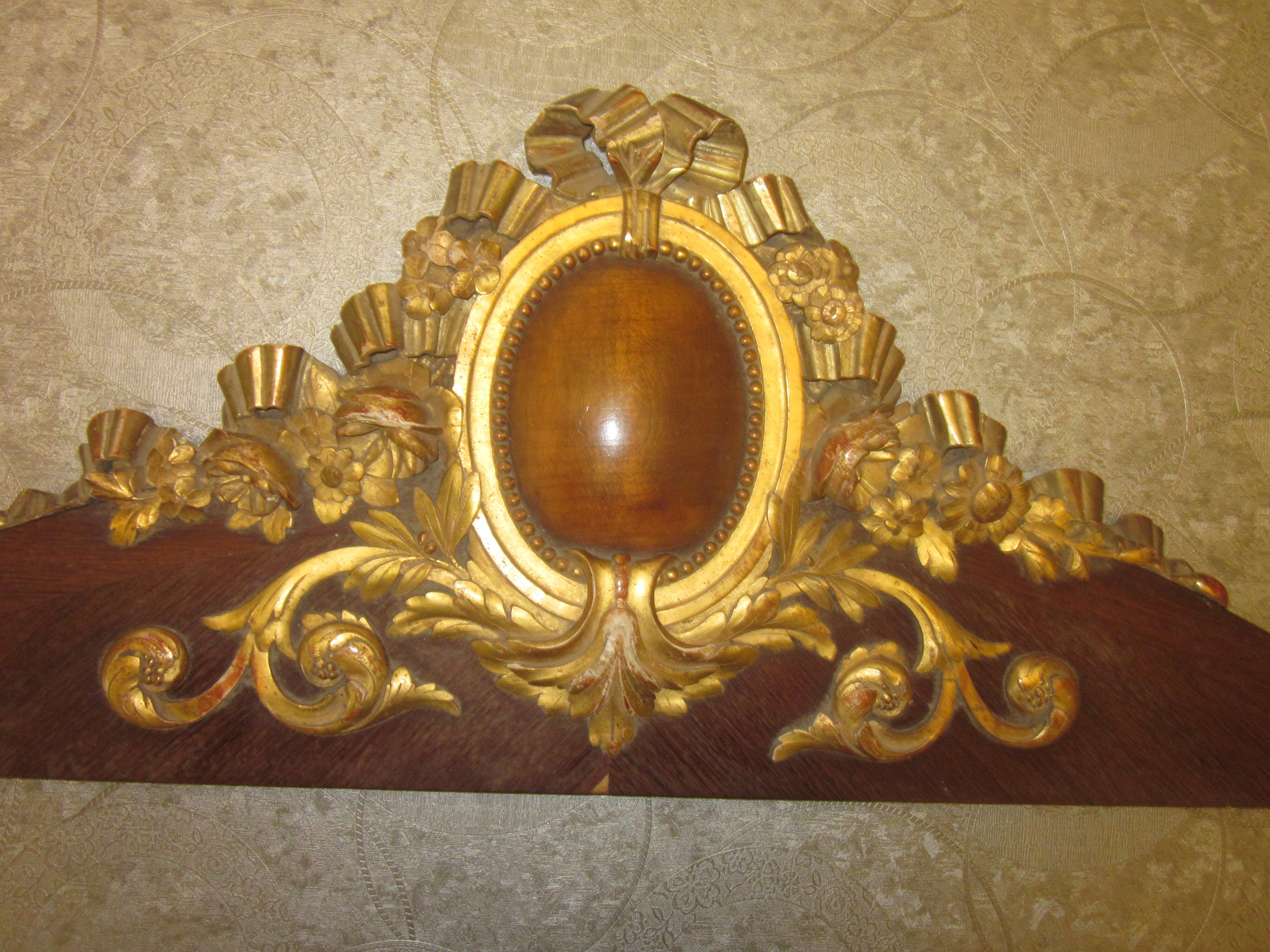 Old wooden pediment stucco