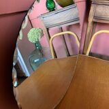 Chiseled oval mirror