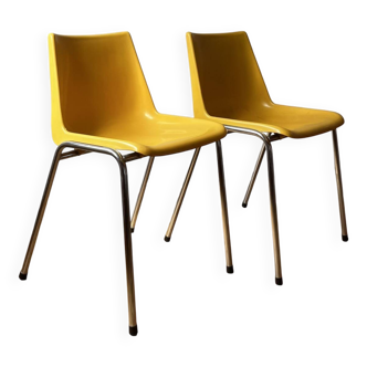 Set of 2 vintage yellow chairs with chrome legs.
