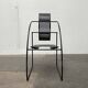 Postmodern black Quinta chair in perforated metal by Mario Botta for Alias, 1980s.