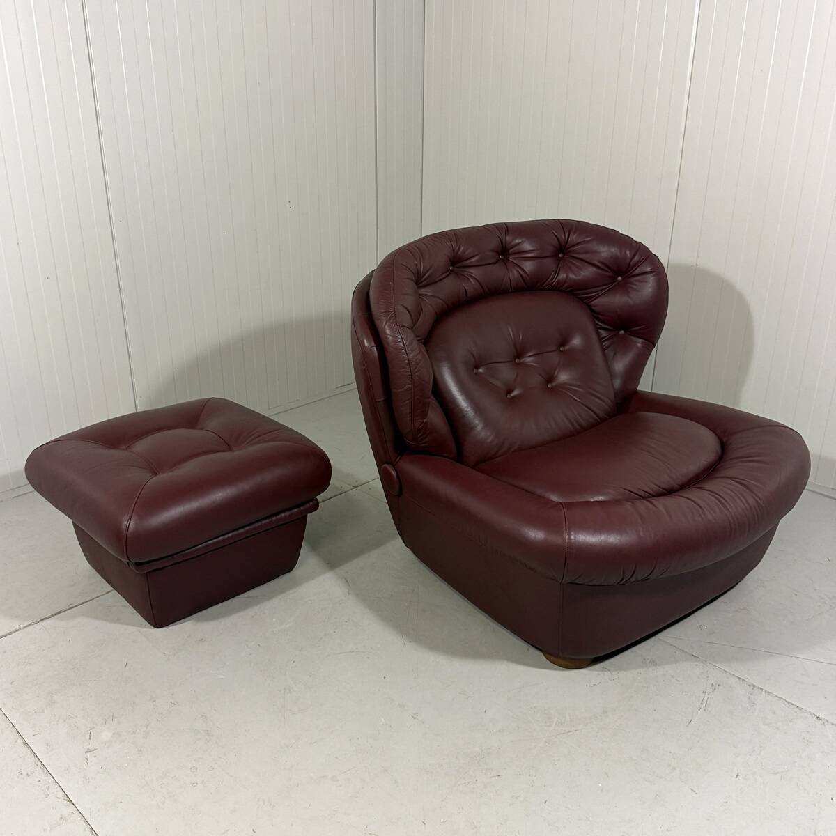 French burgundy leather space age lounge chair & footstool 1970’s