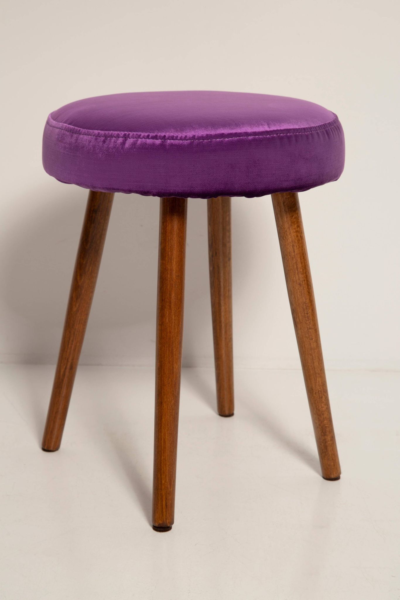 Set of two shiny purple velvet stools from the mid-century, Europe, 1960s.