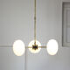Mid-century brass and opaline glass chandelier
