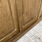 Large row of solid oak loom sliding doors