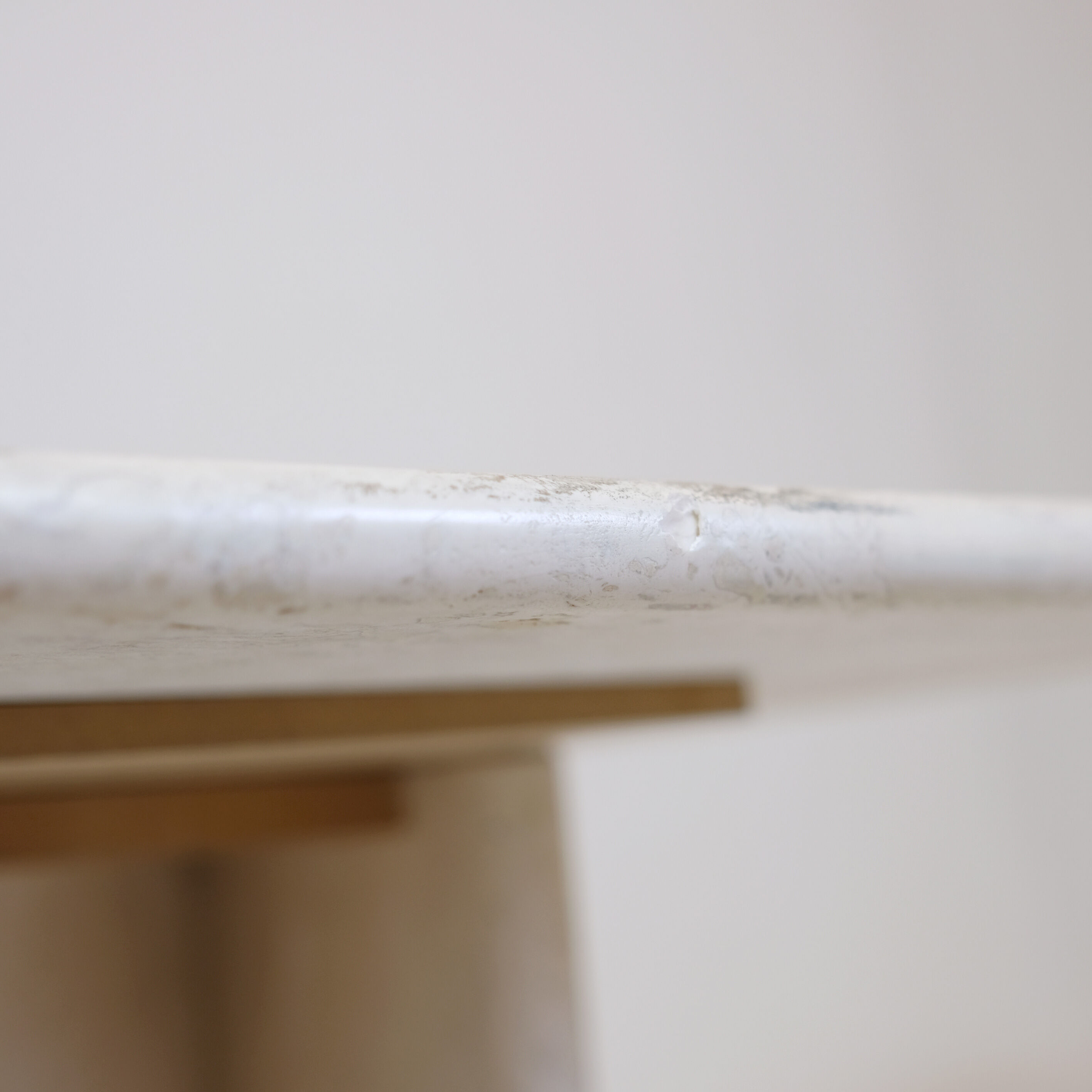 Pair of travertine trundle tables, Italy