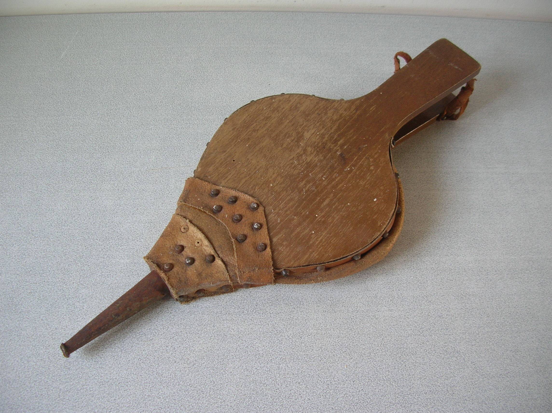 Old wooden and leather fireplace bellows works tool accessory
