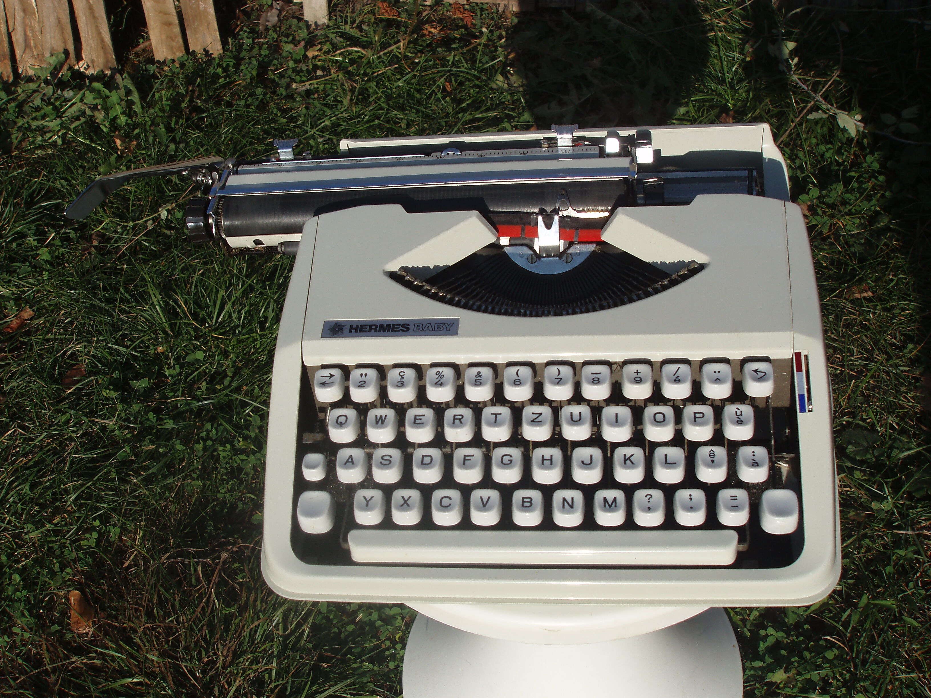 Baby hermes typewriter with manual job and his bag