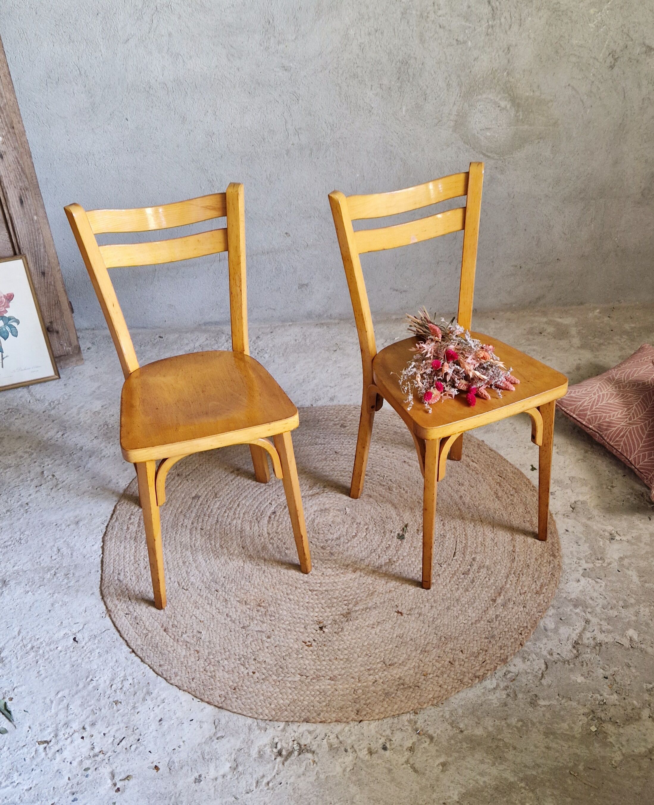Old and pretty pair of Baumann bistro chairs