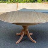 Extendable round dining table with central leg, renovated in raw wood, 150cm