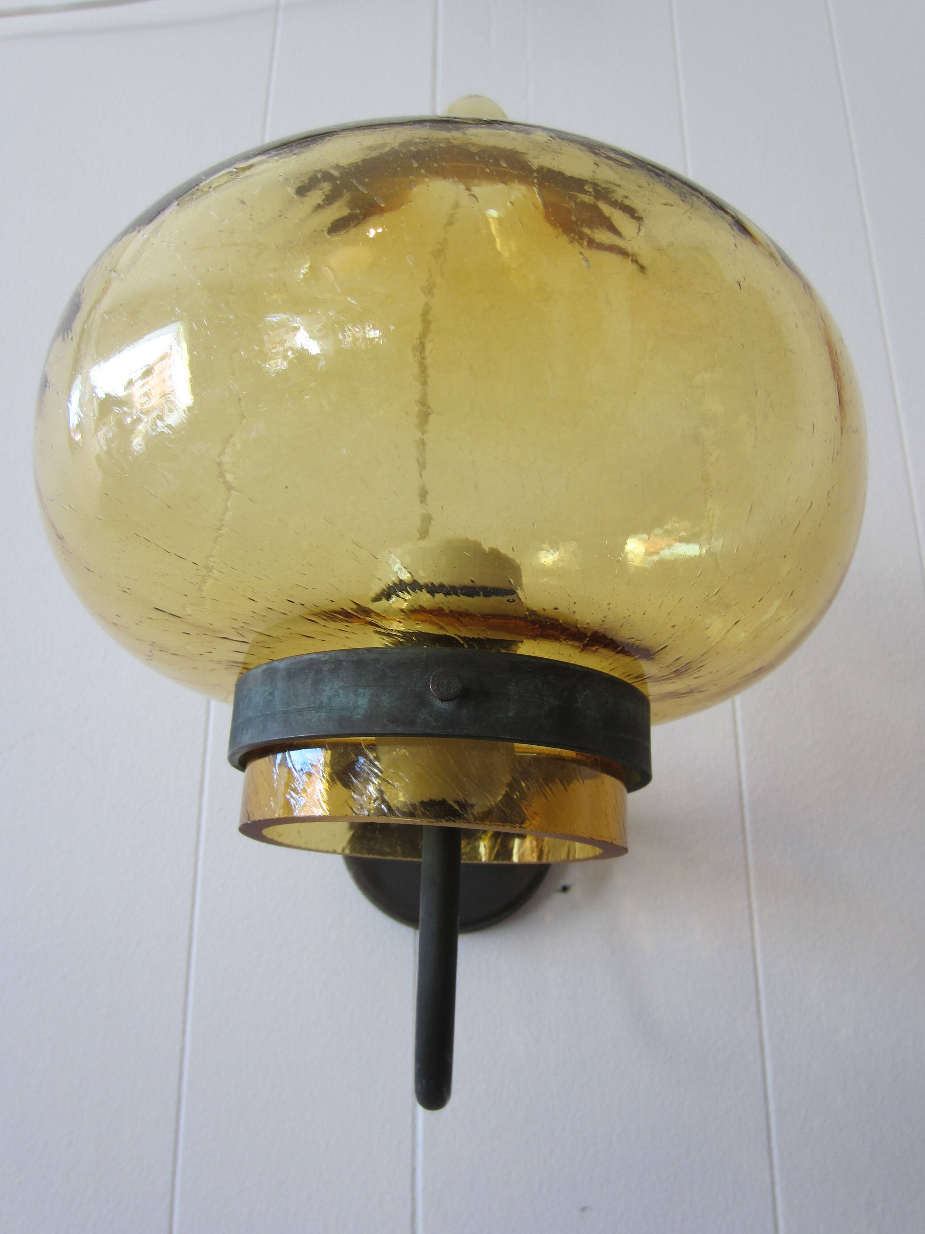 Scandinavian outdoor wall light in copper and amber glass