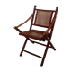 Fauteuil pliant en bambou, cannage, cuir et laiton