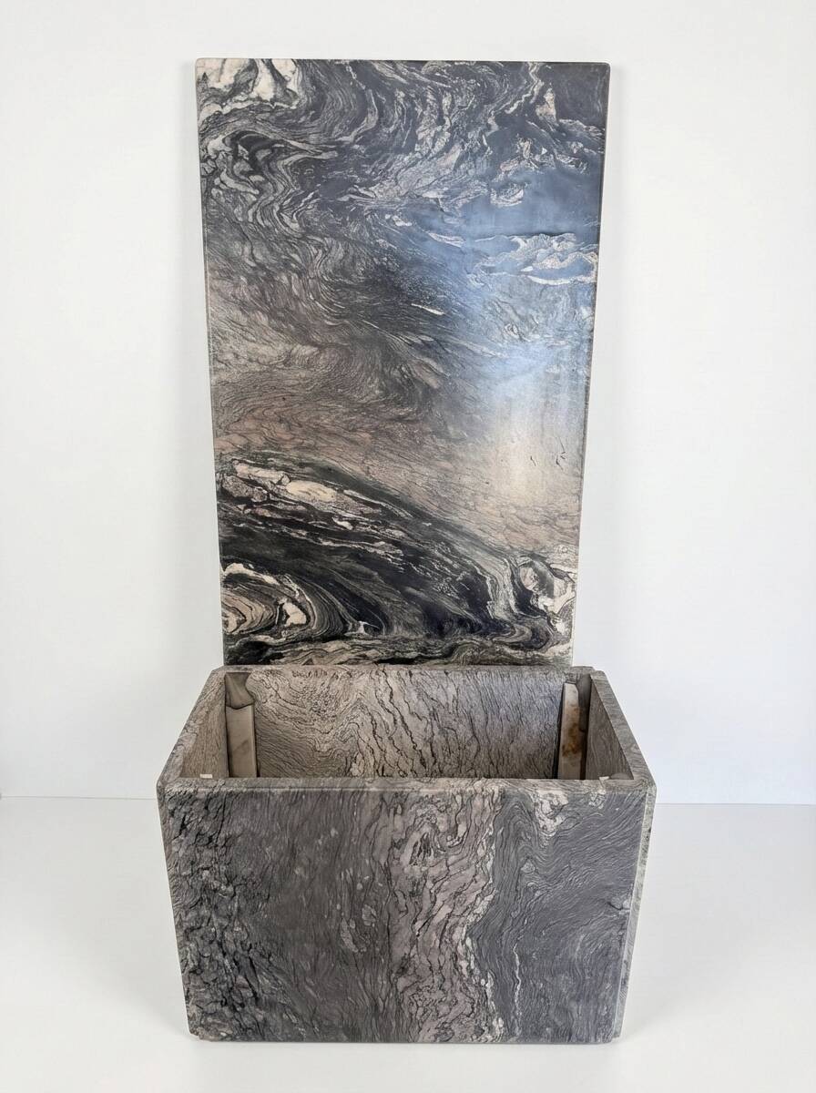 Sculptural coffee table in black and grey marble, postmodern design, years.