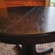 Baumann-type table with 4/8-person extensions.