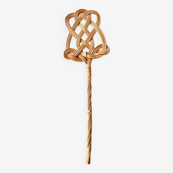 Old woven wicker carpet beater