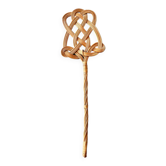 Old woven wicker carpet beater