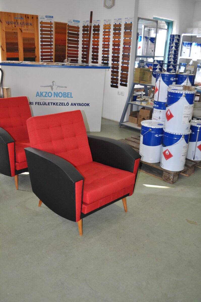 Pair of vintage red fabric armchairs with light wood legs from the 1960s.