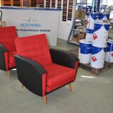 Pair of vintage red fabric armchairs with light wood legs from the 1960s.