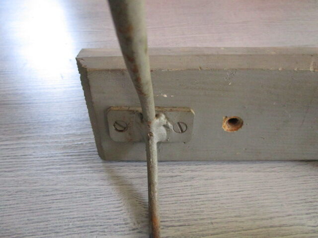 Old coat hangers in wood and metal