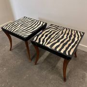 Striking pair of Italian zebra inlaid tessellated stone tables with refined curves
