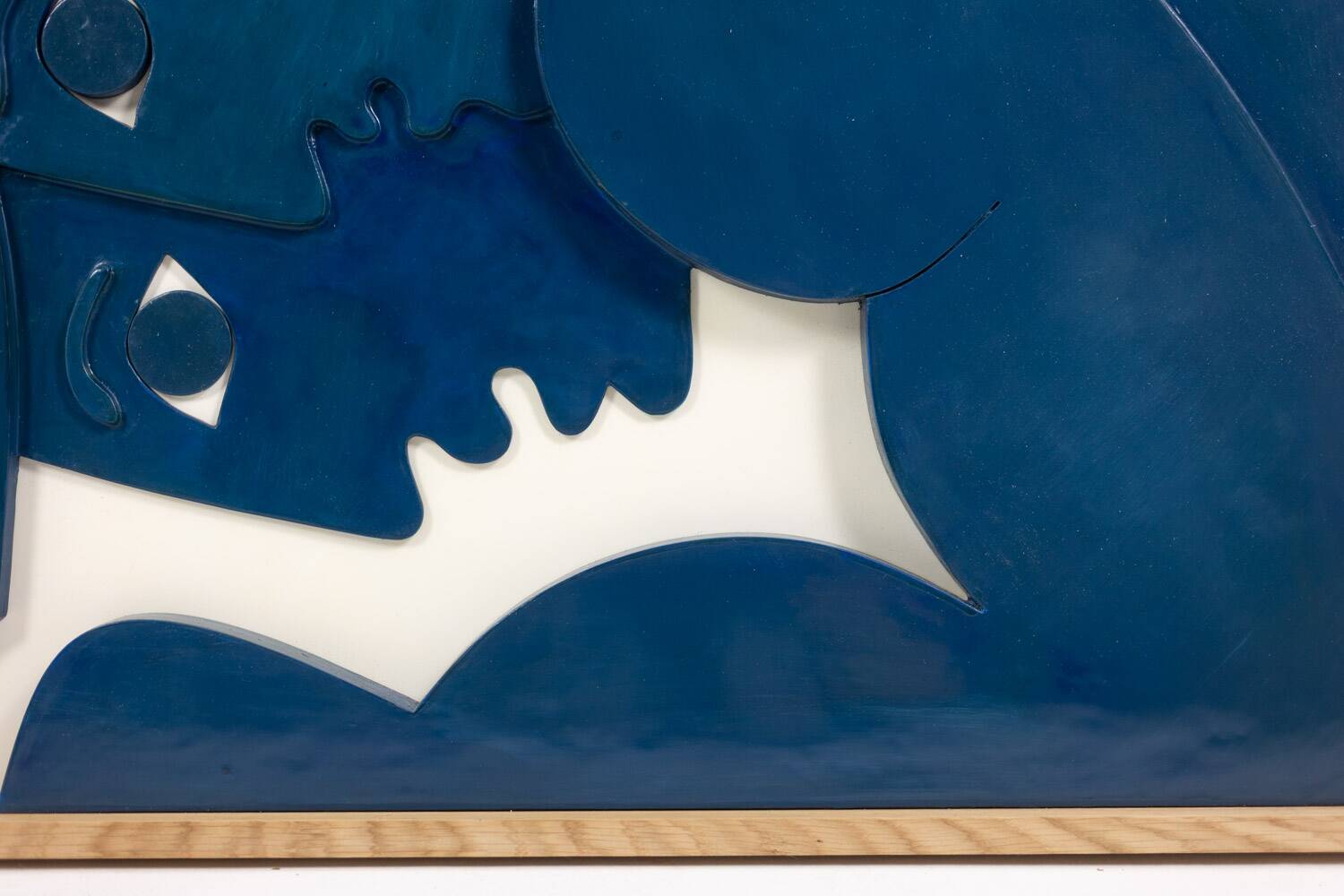 "The Twins". Bas-relief panel in blue lacquered wood. Contemporary.