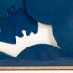 "The Twins". Bas-relief panel in blue lacquered wood. Contemporary.