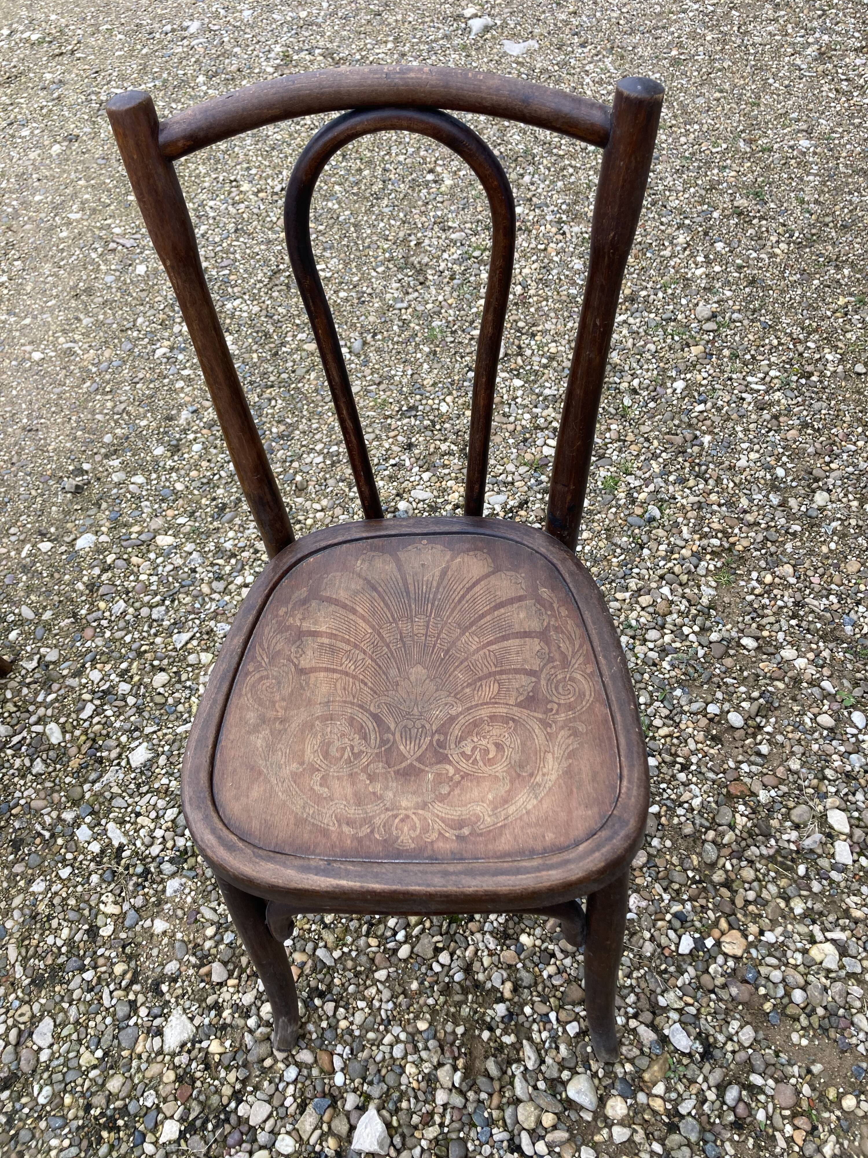 6 mismatched bistro chairs