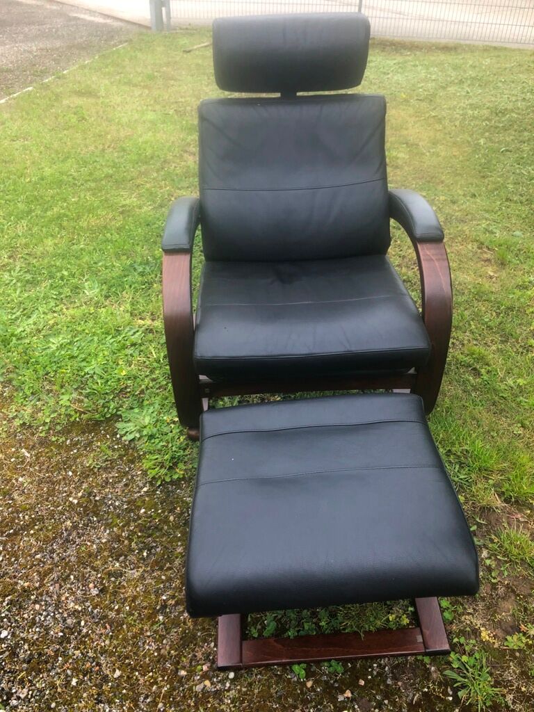 Armchair with its designer footrest Nelo Sweden