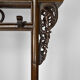 Wardrobe with Asian coat made of wood carved with dragons