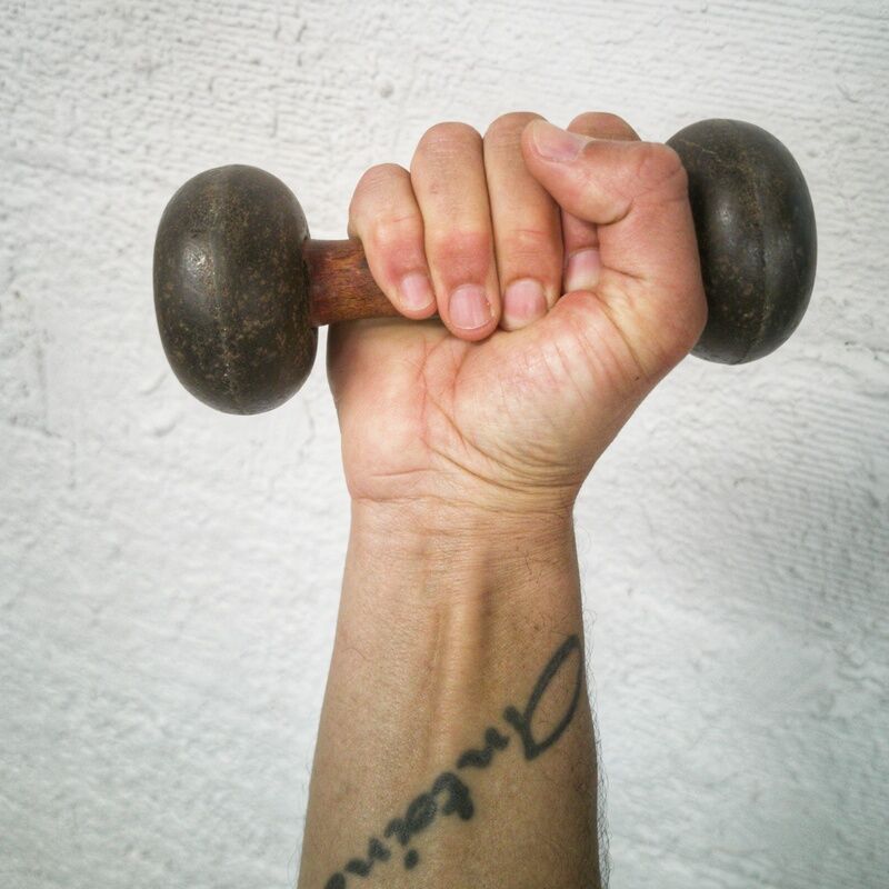 Pair of vintage dumbbells in cast iron and wood