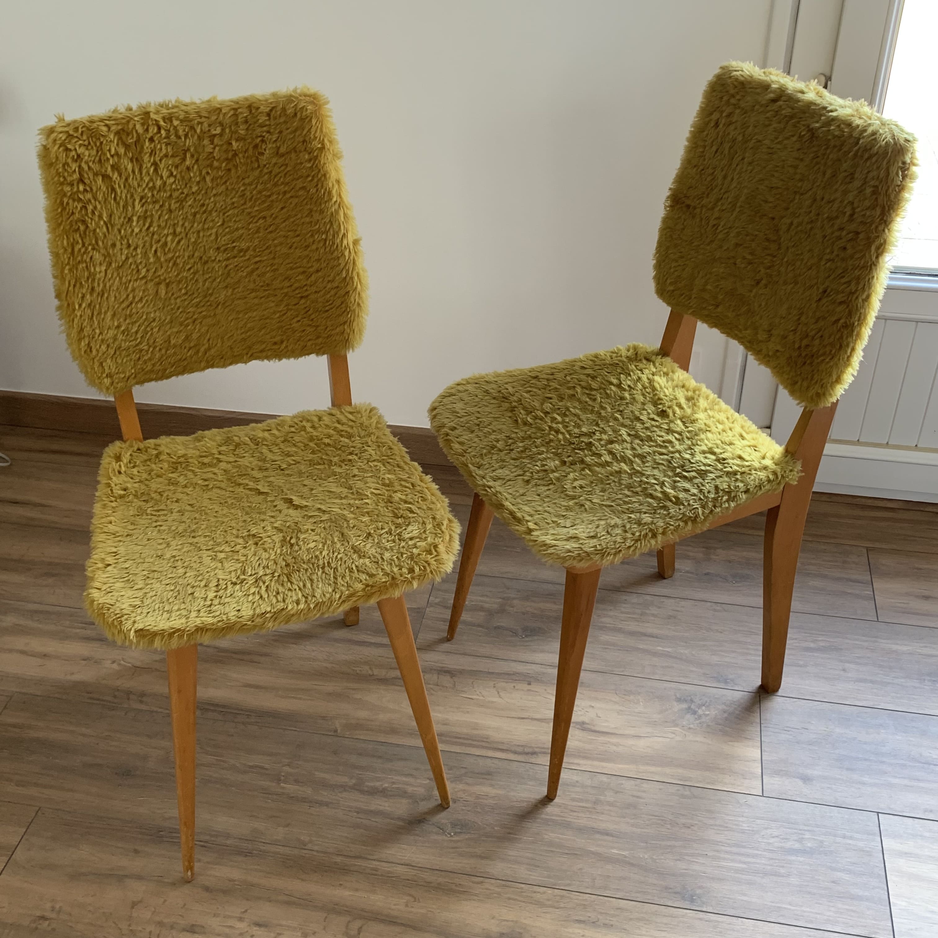 2 yellow moumoute chairs