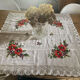 Linen tablecloth with embroidered flowers