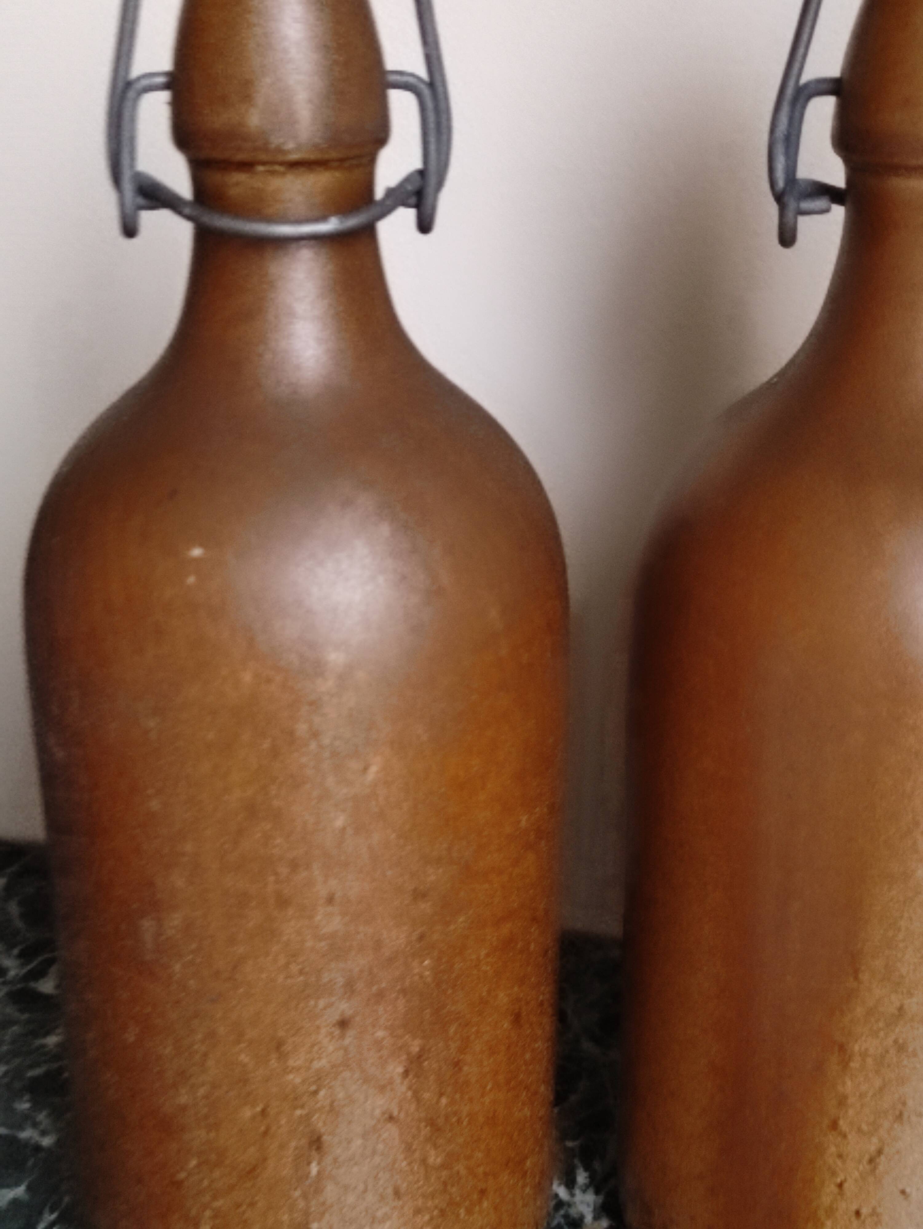 Lot 2 old bottles in glazed stoneware 0.5 L