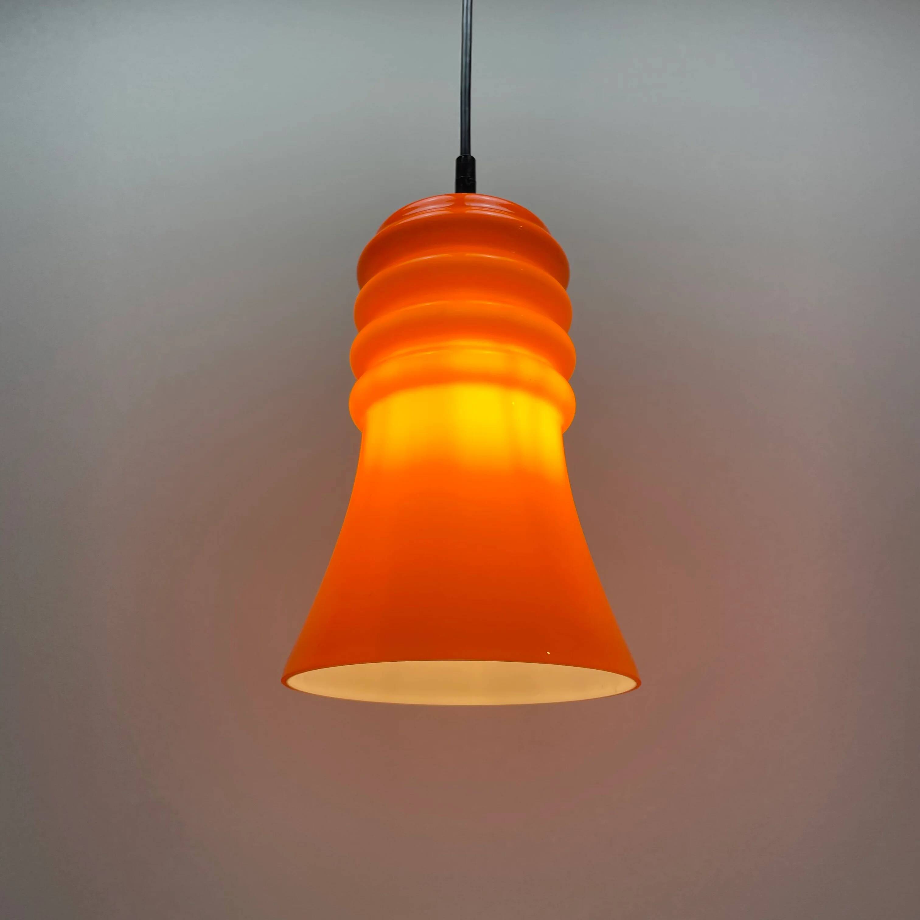 Rare orange glass trumpet-shaped pendant light by Peill & Putzler, 1960.