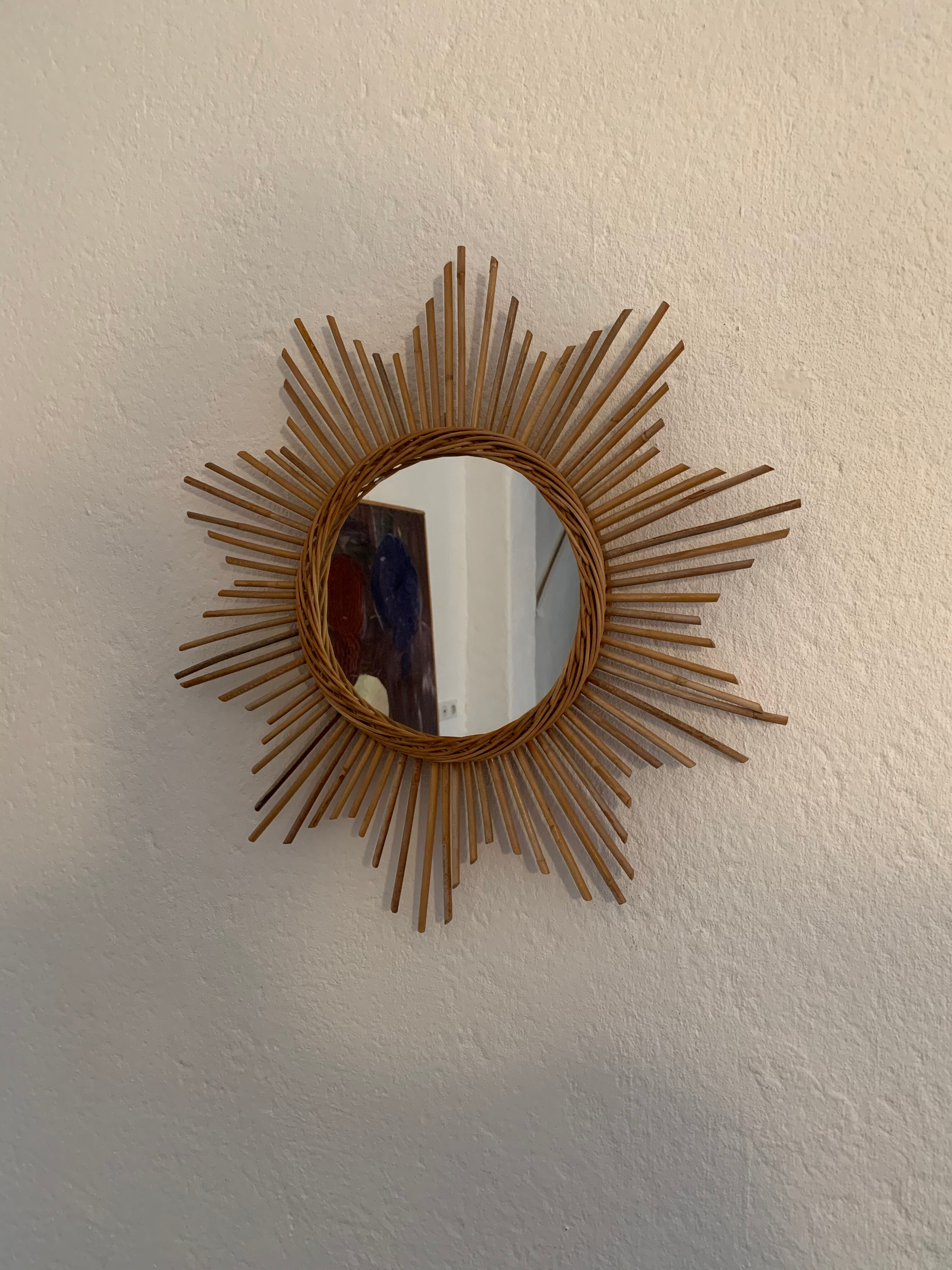 Vintage rattan sun mirror