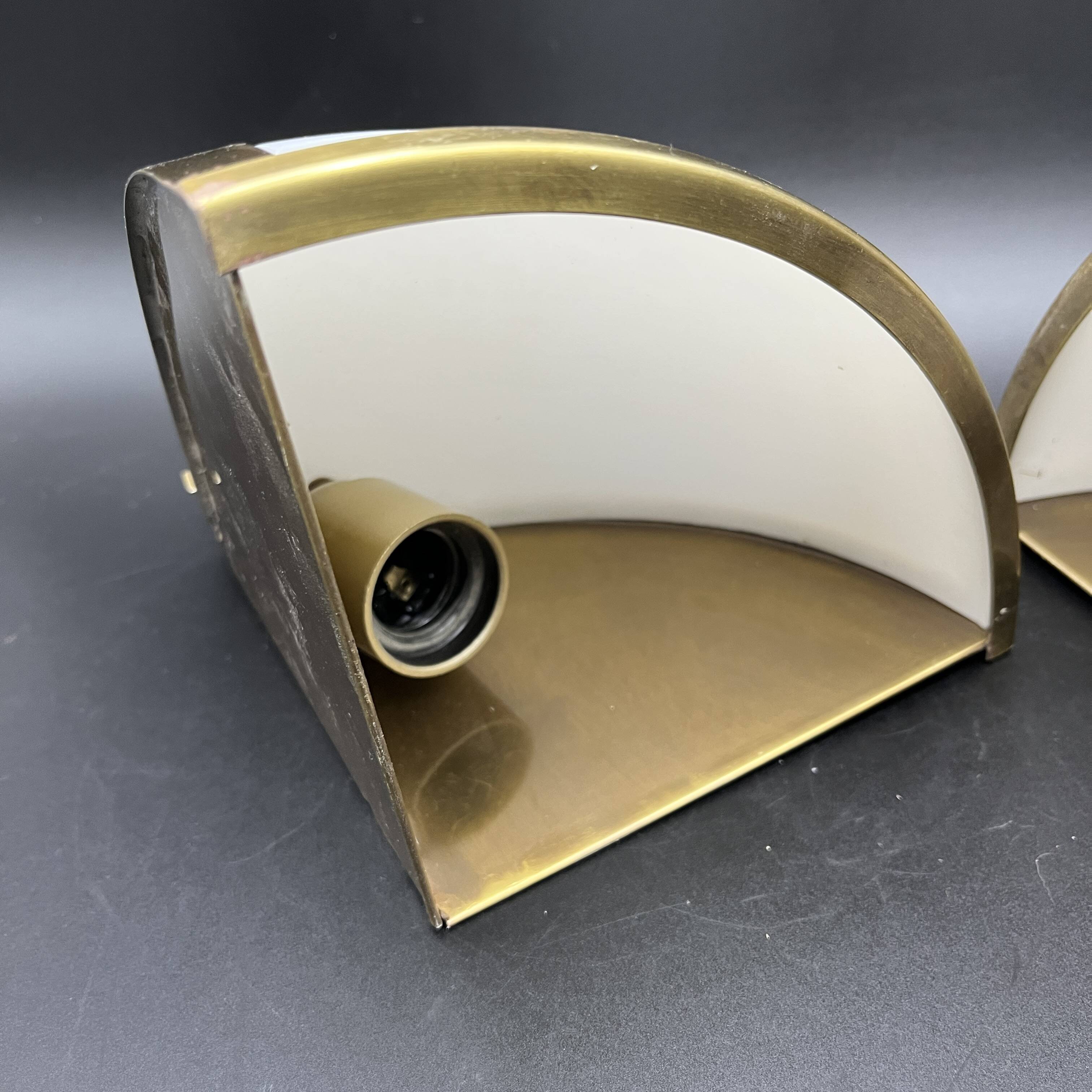 Pair of corner sconces in golden brass and matt opaline