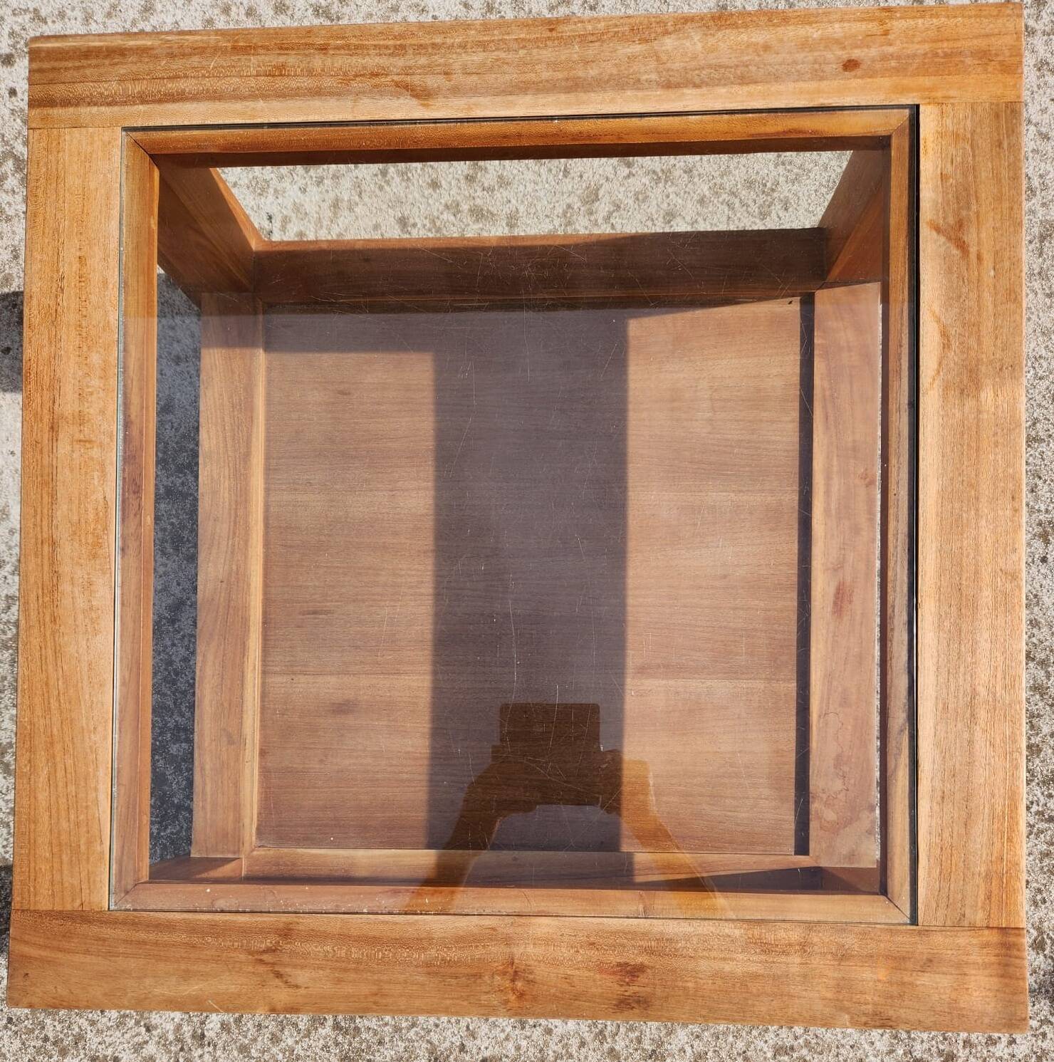 Glass coffee table in wood