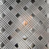 Old wall lamp in cast aluminum and squared glass