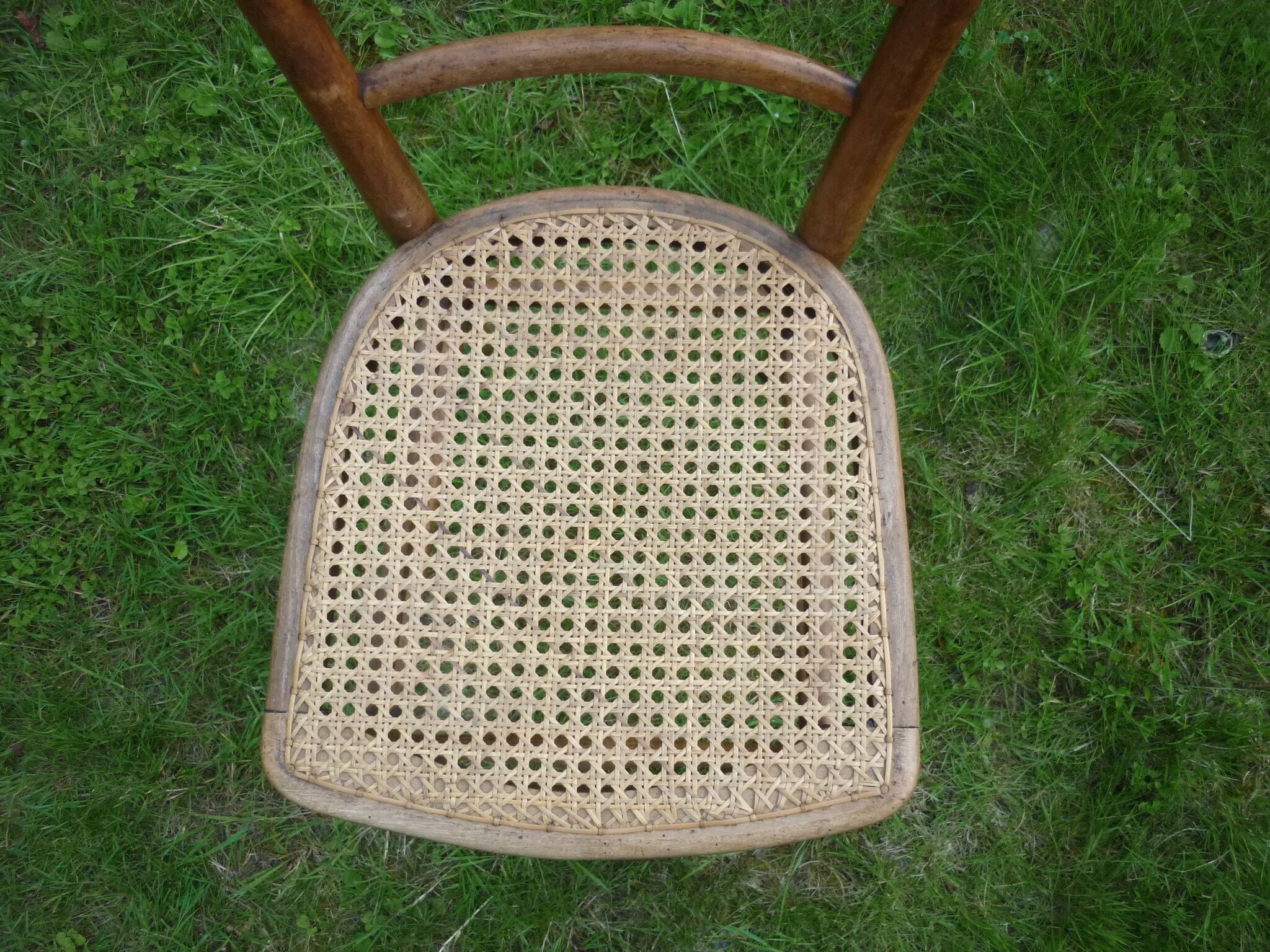 Wooden bistro style cane chair