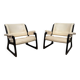 Set of two Baumann sled lounge chairs.