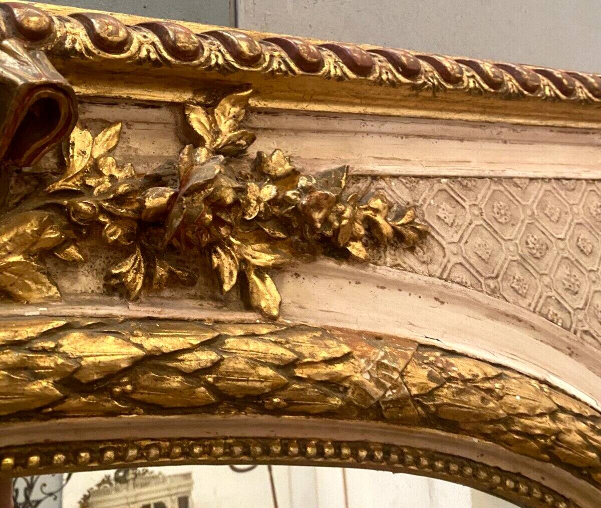 Louis XV style mirror in wood and gilded and patinated stucco 19th century