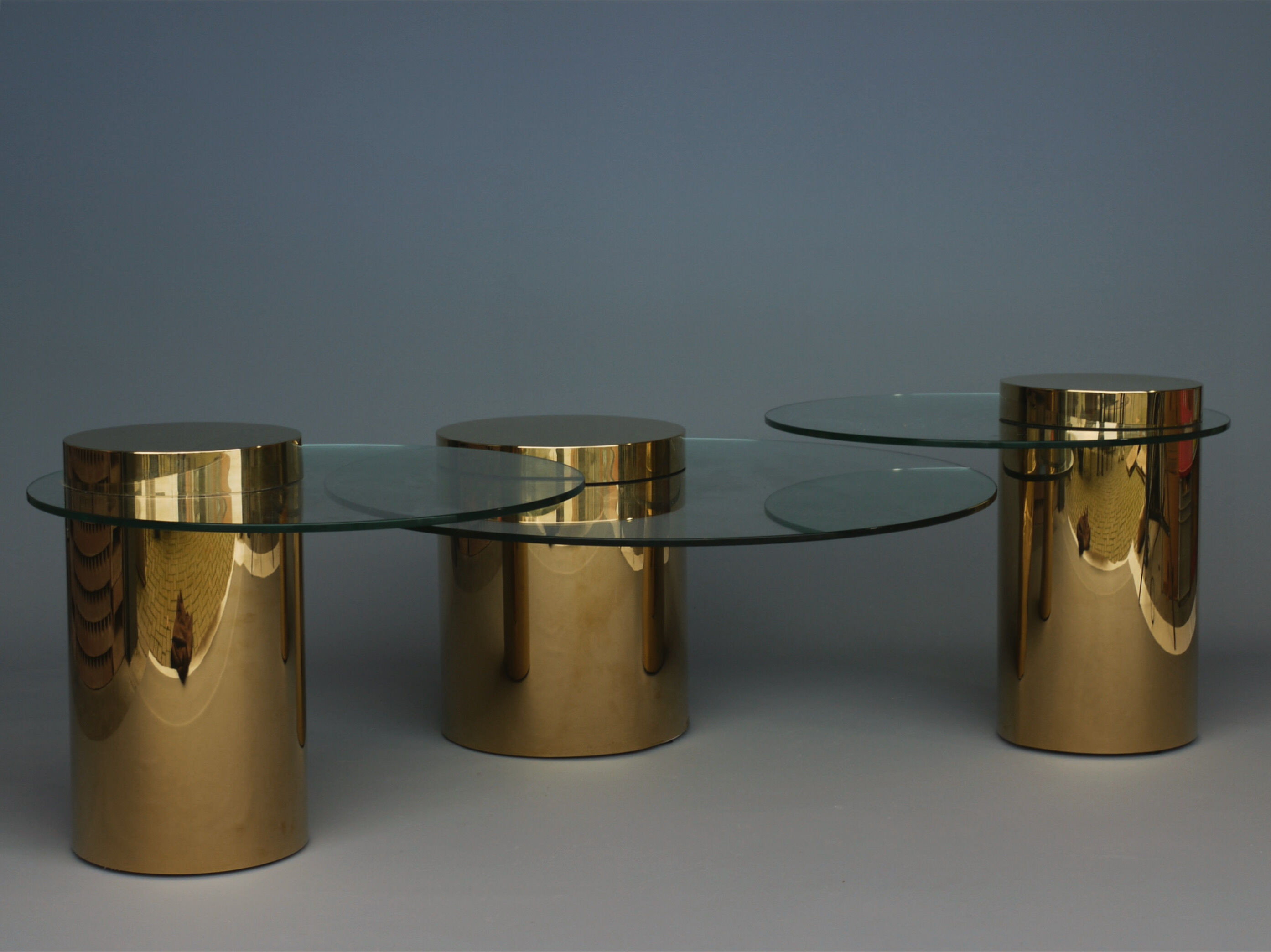 Polished Brass and Glass Low Tables. 2000s. Set of 3